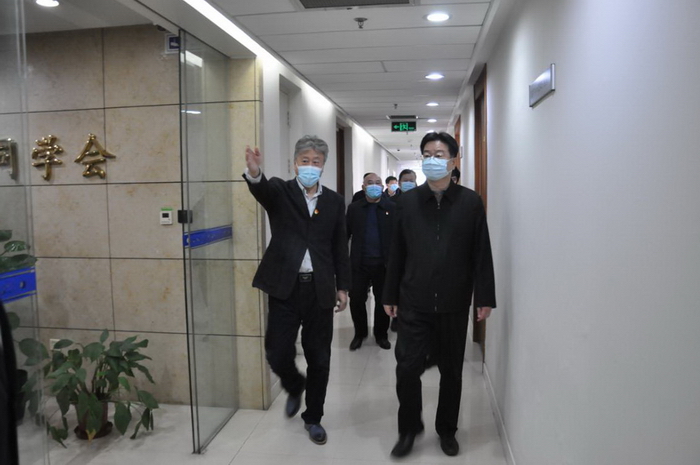 市委常委、统战部部长游钧走访市黄埔军校同学会.jpg