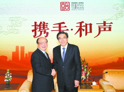 中共中央政治局委员、北京市委书记郭金龙与荣誉团长胡志强（左）亲切会见。.jpg